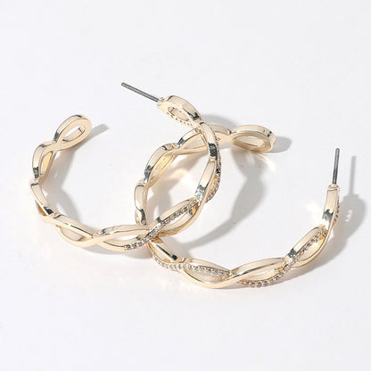 14K Gold Plated CZ Stone Paved Twisted Hoop Earrings